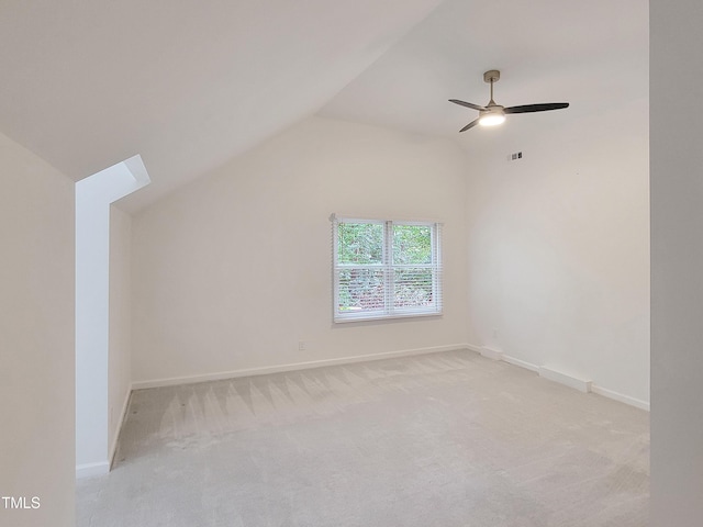 107 Long Shadow Ln, Cary, NC 27518 - additional living space featuring vaulted ceiling, light carpet, baseboards, and ceiling fan