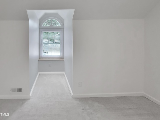 107 Long Shadow Ln, Cary, NC 27518 - carpeted spare room featuring lofted ceiling and baseboards