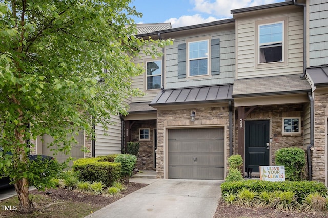 256 Rubrum Dr, Hillsborough, NC 27278 - multi unit property featuring a garage, stone siding, concrete driveway, a standing seam roof, and a metal roof