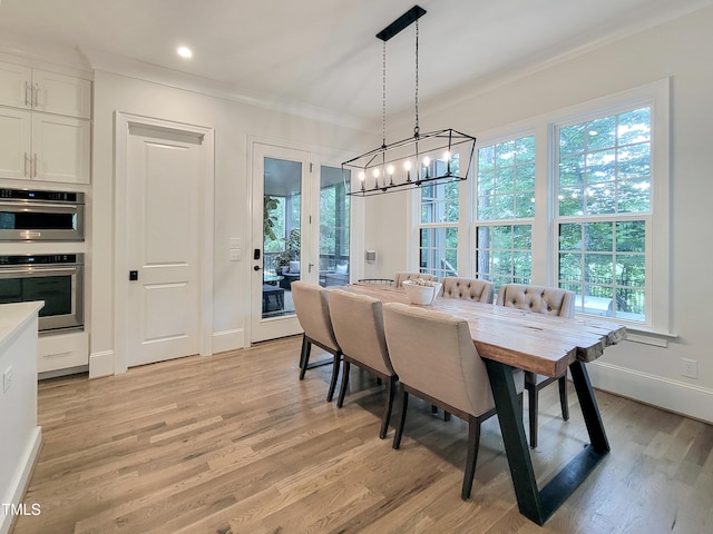 3160 Mantle Ridge Dr, Apex, NC 27502 - dining area with crown molding, a chandelier, light wood-type flooring, baseboards, and recessed lighting