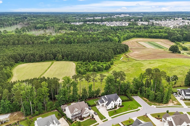 3160 Mantle Ridge Dr, Apex, NC 27502 - aerial perspective of suburban area featuring a forest