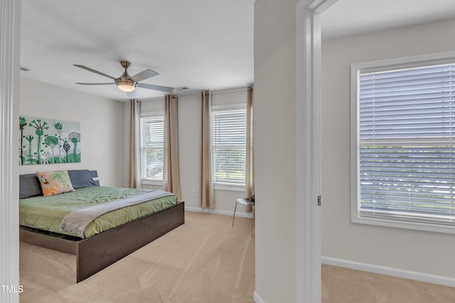 711 Keystone Park Dr Unit 7, Morrisville, NC 27560 - carpeted bedroom featuring baseboards and a ceiling fan