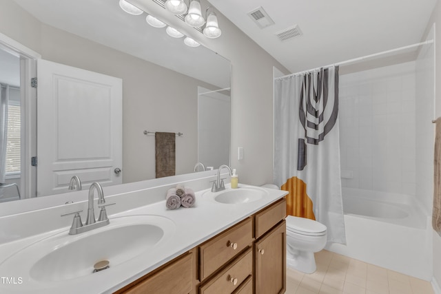711 Keystone Park Dr Unit 7, Morrisville, NC 27560 - full bath featuring toilet, double vanity, shower / tub combo with curtain, and tile patterned flooring