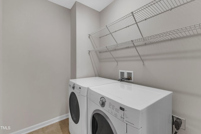 711 Keystone Park Dr Unit 7, Morrisville, NC 27560 - laundry room with washer and dryer and baseboards