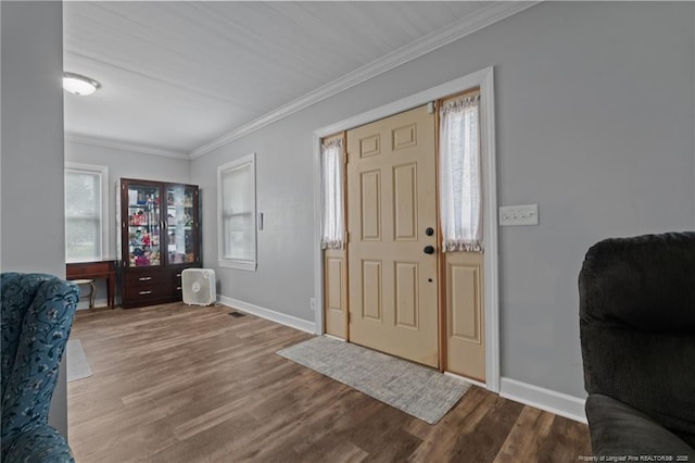 521 Cedar Creek Rd, Fayetteville, NC 28312 - foyer featuring crown molding, wood finished floors, and baseboards
