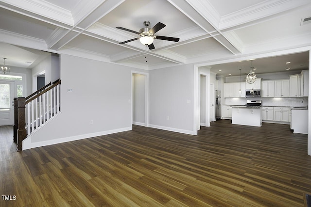 unfurnished living room featuring coffered ceiling, baseboards, dark wood-type flooring, a chandelier, and beam ceiling