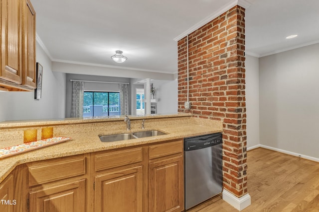 kitchen featuring stainless steel dishwasher, a sink, light stone counters, crown molding, and light wood finished floors