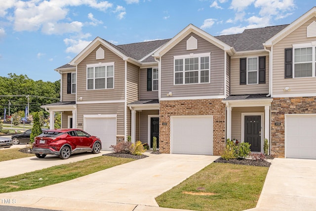 1230 Adrian Ct, Mebane, NC 27302 - townhome / multi-family property with concrete driveway, an attached garage, and a shingled roof