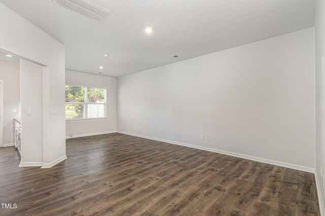 1230 Adrian Ct, Mebane, NC 27302 - spare room with dark wood-type flooring, baseboards, and recessed lighting