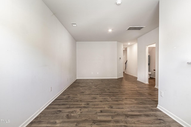 1230 Adrian Ct, Mebane, NC 27302 - spare room with dark wood-style flooring, baseboards, recessed lighting, and a smoke detector