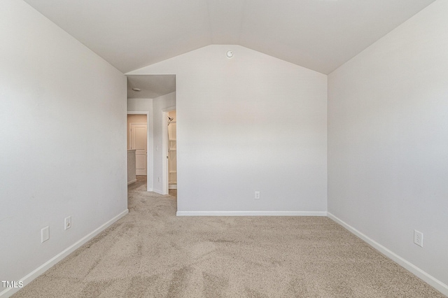 1230 Adrian Ct, Mebane, NC 27302 - empty room with carpet floors, lofted ceiling, and baseboards