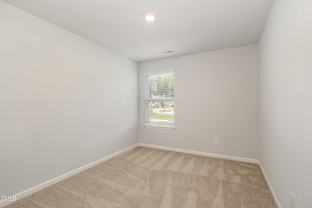 1230 Adrian Ct, Mebane, NC 27302 - unfurnished room featuring baseboards, light colored carpet, and recessed lighting