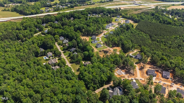 1329 Wynncrest Ct, Raleigh, NC 27603 - aerial view of property and surrounding area with a forest