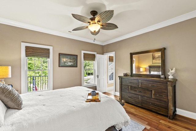 1329 Wynncrest Ct, Raleigh, NC 27603 - bedroom featuring crown molding, baseboards, wood finished floors, and a ceiling fan