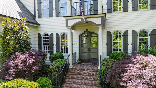 1329 Wynncrest Ct, Raleigh, NC 27603 - doorway to property with french doors and a balcony
