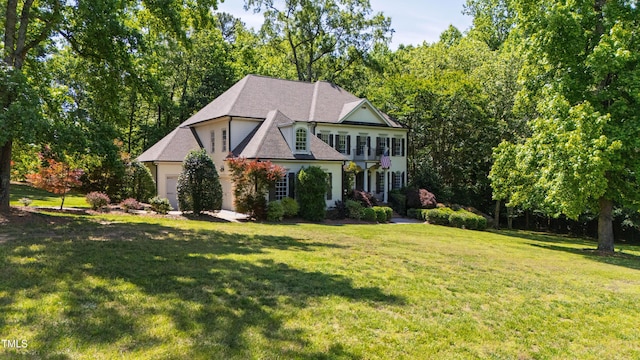 1329 Wynncrest Ct, Raleigh, NC 27603 - view of front of property featuring a front lawn, roof with shingles, and an attached garage