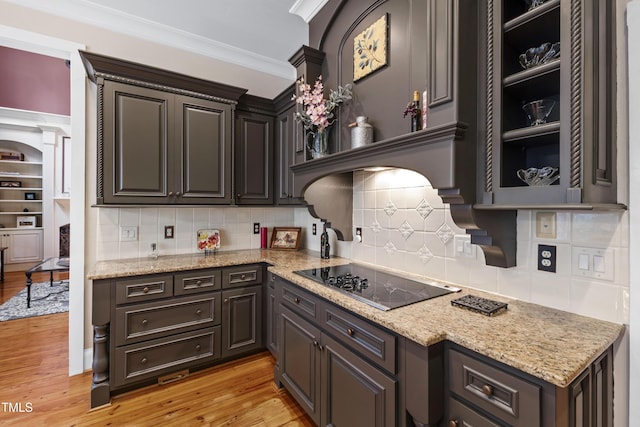 1329 Wynncrest Ct, Raleigh, NC 27603 - kitchen featuring black electric cooktop, ornamental molding, light wood-style flooring, open shelves, and backsplash