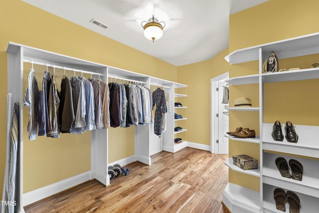 1329 Wynncrest Ct, Raleigh, NC 27603 - walk in closet with wood finished floors