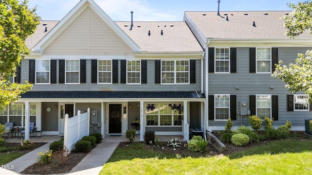 1313 Legacy Greene Ave, Wake Forest, NC 27587 - view of property with covered porch and roof with shingles