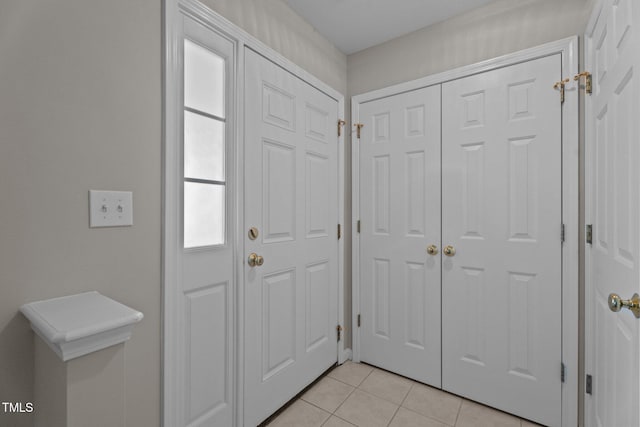 1313 Legacy Greene Ave, Wake Forest, NC 27587 - foyer entrance with light tile patterned floors