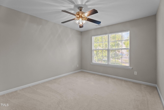 1313 Legacy Greene Ave, Wake Forest, NC 27587 - spare room with baseboards, light colored carpet, and a ceiling fan