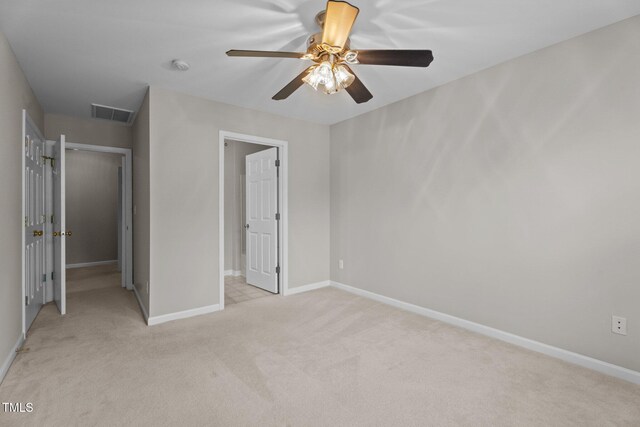 1313 Legacy Greene Ave, Wake Forest, NC 27587 - unfurnished bedroom with light colored carpet, baseboards, and a ceiling fan