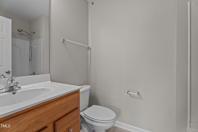1313 Legacy Greene Ave, Wake Forest, NC 27587 - full bathroom featuring toilet, vanity, a shower, tile patterned flooring, and baseboards