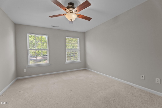 1313 Legacy Greene Ave, Wake Forest, NC 27587 - empty room featuring baseboards, light carpet, and ceiling fan