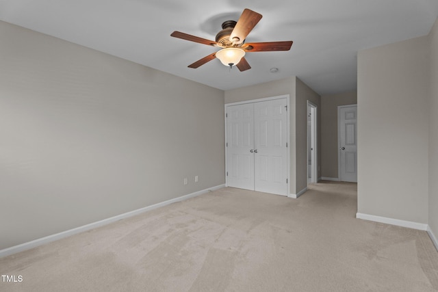 1313 Legacy Greene Ave, Wake Forest, NC 27587 - unfurnished bedroom with light carpet, baseboards, a closet, and ceiling fan