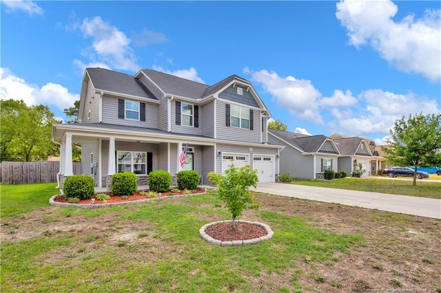 3821 Shire St, Hope Mills, NC 28348 - view of front of property with driveway, covered porch, and a garage