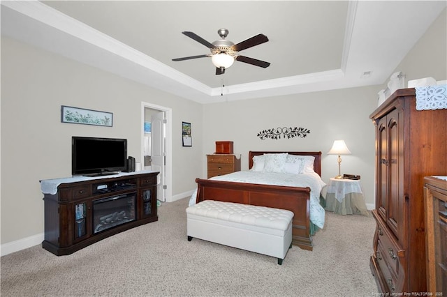 3821 Shire St, Hope Mills, NC 28348 - carpeted bedroom featuring a tray ceiling, baseboards, a ceiling fan, and crown molding