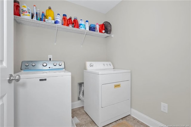 3821 Shire St, Hope Mills, NC 28348 - clothes washing area with washer and clothes dryer and baseboards