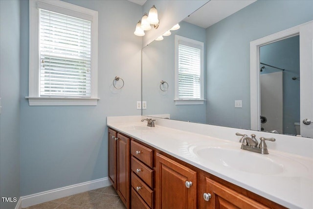 120 Tanager Farms Dr, Youngsville, NC 27596 - full bath featuring baseboards, double vanity, toilet, and a shower
