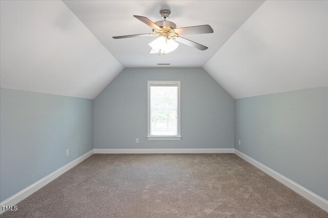 120 Tanager Farms Dr, Youngsville, NC 27596 - additional living space featuring carpet, lofted ceiling, and baseboards