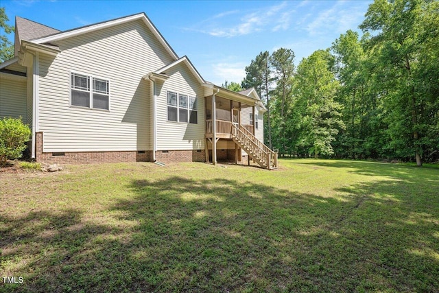 120 Tanager Farms Dr, Youngsville, NC 27596 - back of property featuring crawl space, a lawn, and stairs