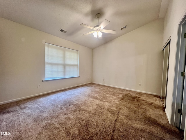 5911 Endsley Ct, Raleigh, NC 27610 - carpeted spare room featuring ceiling fan, vaulted ceiling, and baseboards