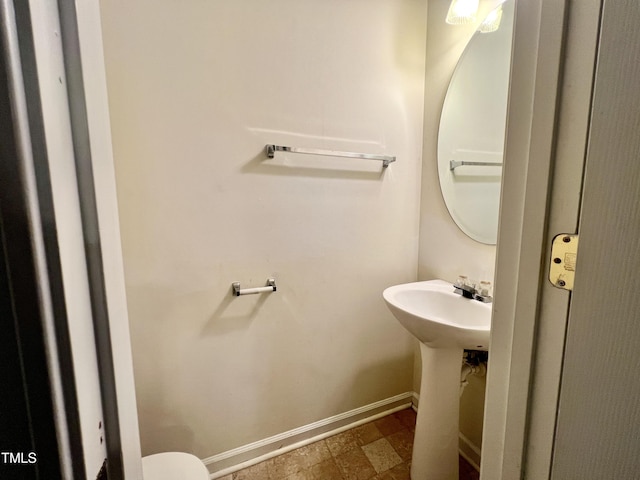 5911 Endsley Ct, Raleigh, NC 27610 - half bathroom with baseboards