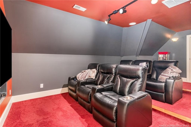  - carpeted cinema with baseboards and lofted ceiling