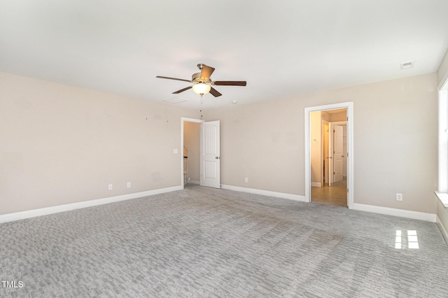 123 Gunderson Ln, Garner, NC 27529 - unfurnished bedroom with light carpet, baseboards, and ceiling fan
