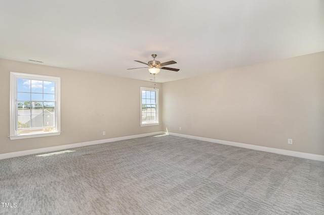 123 Gunderson Ln, Garner, NC 27529 - carpeted spare room featuring ceiling fan and baseboards