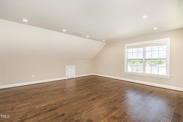 123 Gunderson Ln, Garner, NC 27529 - additional living space featuring dark wood-style flooring, baseboards, lofted ceiling, and recessed lighting