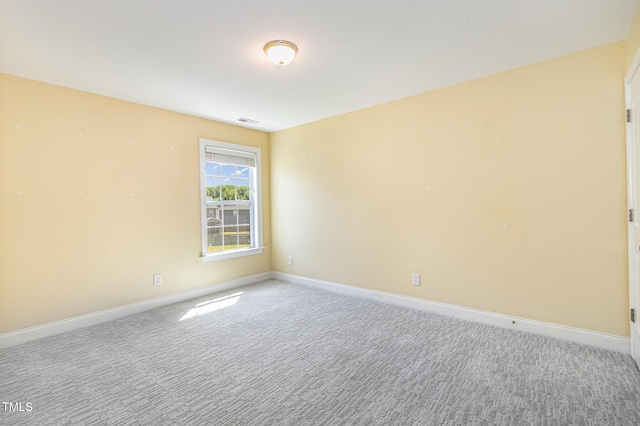 123 Gunderson Ln, Garner, NC 27529 - carpeted empty room featuring baseboards