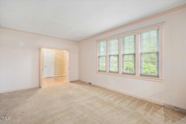8133 Holly Forest Rd, Wake Forest, NC 27587 - carpeted spare room with crown molding and baseboards
