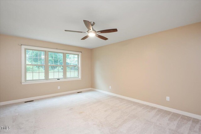8133 Holly Forest Rd, Wake Forest, NC 27587 - spare room with a ceiling fan, baseboards, and light colored carpet