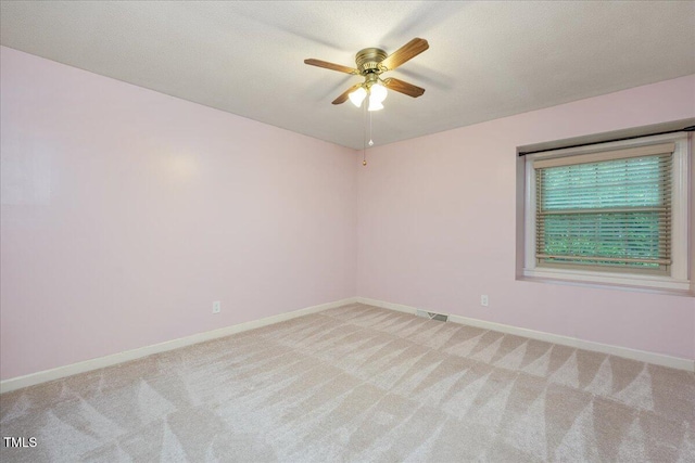 8133 Holly Forest Rd, Wake Forest, NC 27587 - empty room with light colored carpet, ceiling fan, and baseboards