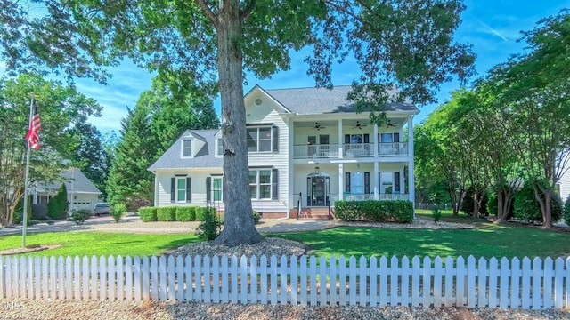 8042 Hogan Dr, Wake Forest, NC 27587 - neoclassical home featuring a ceiling fan and covered porch