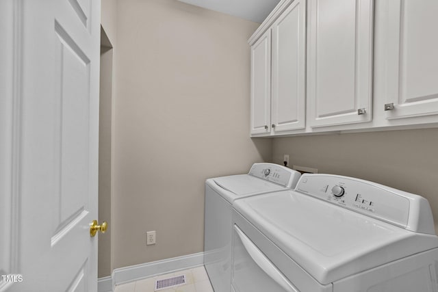 3923 Napa Valley Dr, Raleigh, NC 27612 - laundry room with washer and dryer, baseboards, and cabinet space