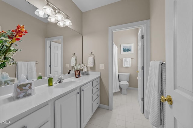 3923 Napa Valley Dr, Raleigh, NC 27612 - full bathroom featuring tile patterned floors, vanity, toilet, and baseboards