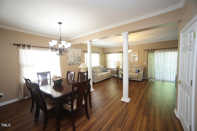 dining area with ornate columns, dark wood-style flooring, crown molding, a chandelier, and baseboards