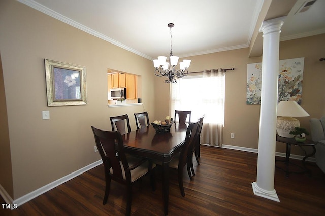 dining area with dark wood finished floors, ornate columns, a chandelier, baseboards, and ornamental molding